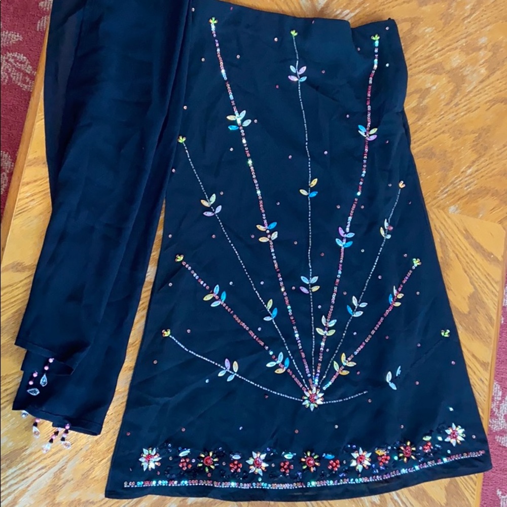 long black skirt and scarf.